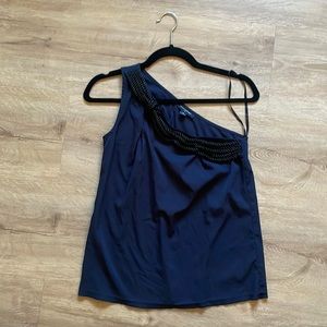 Banana republic navy asymmetric top with black braiding detail. Silk-like.